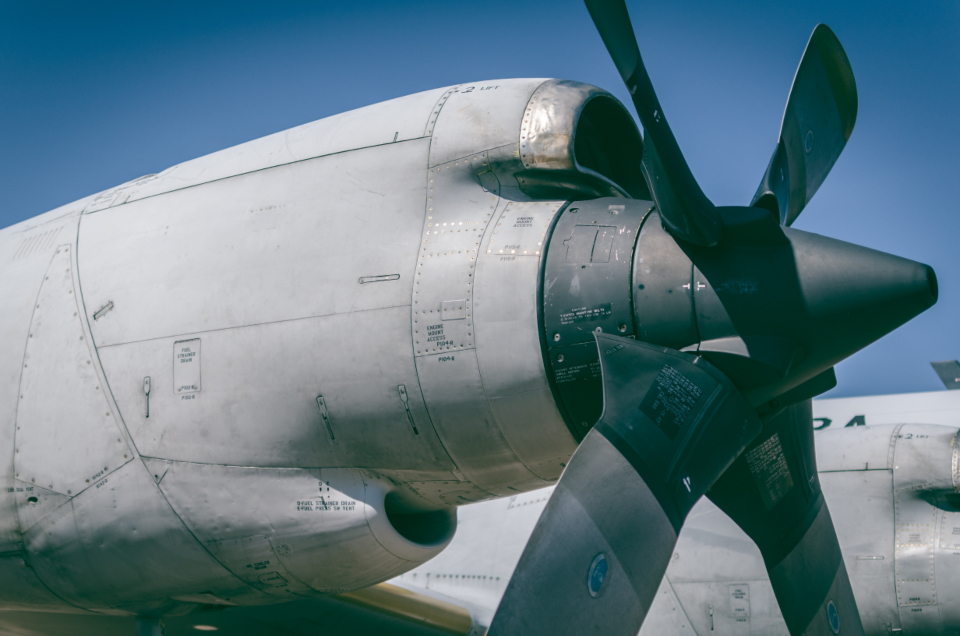 Close-up of an aircraft engine and propeller assembly