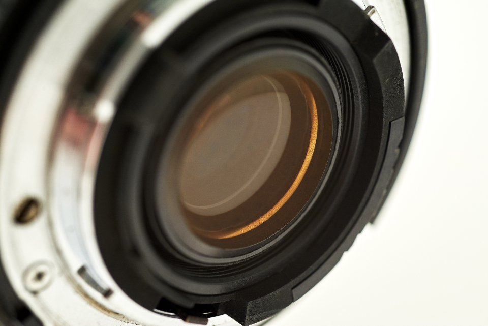 Macro close-up of a precision optical lens used in research and testing instruments