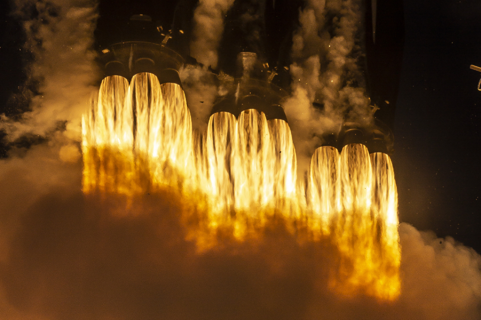 Rocket engine ignition representing space technology companies