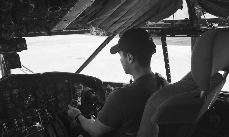 Pilot training inside aircraft cockpit