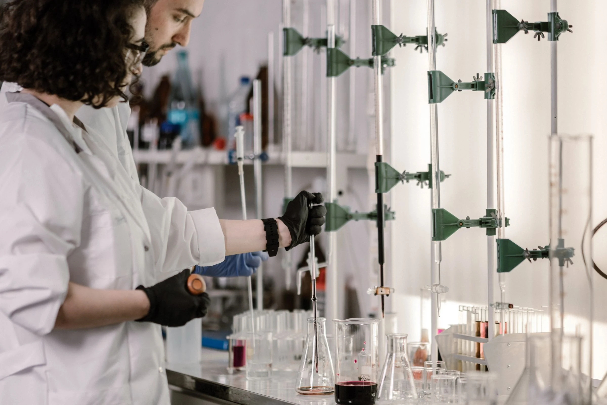 Scientists working with lab samples in a biotechnology research laboratory