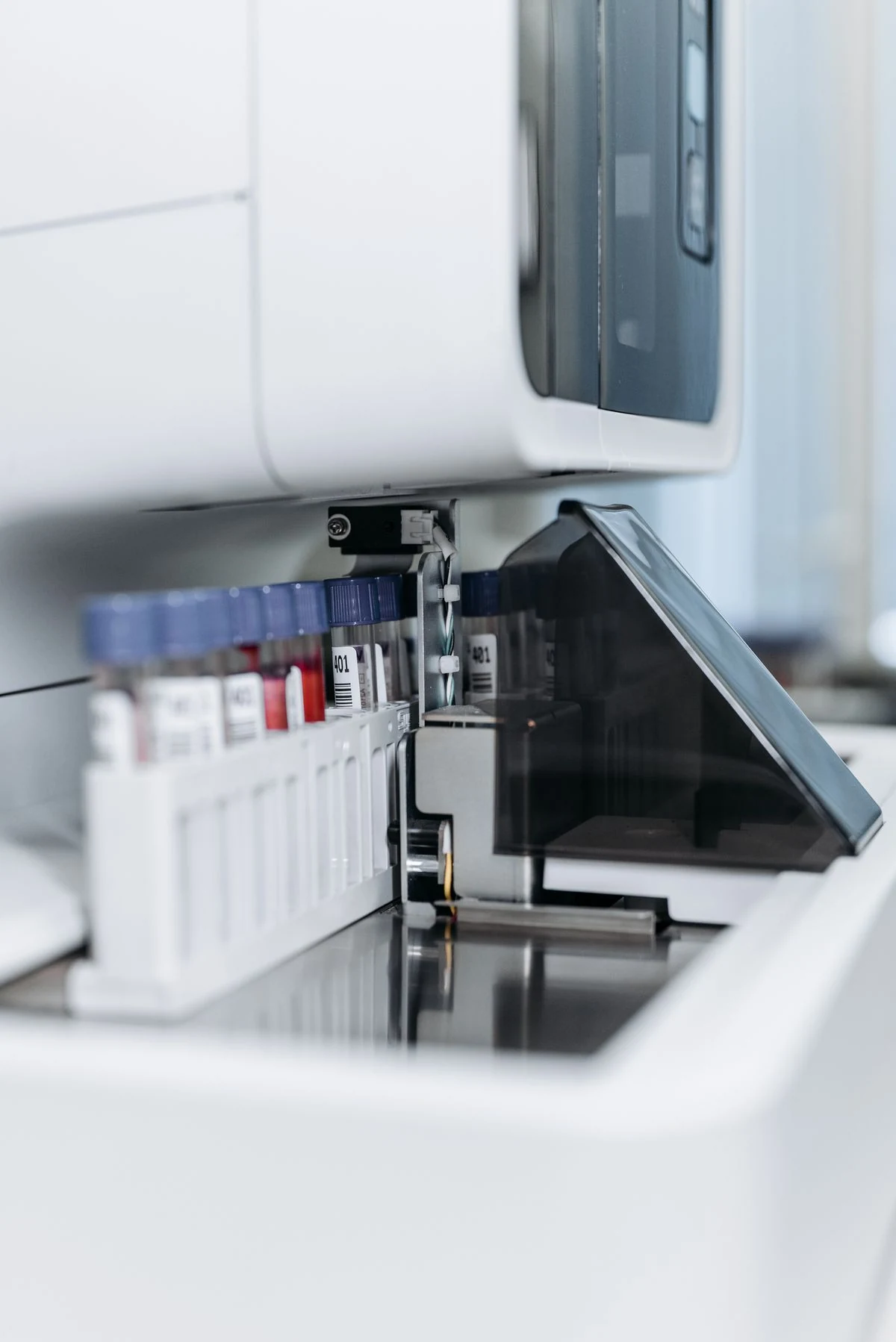 Automated diagnostic analyzer loading labeled sample tubes