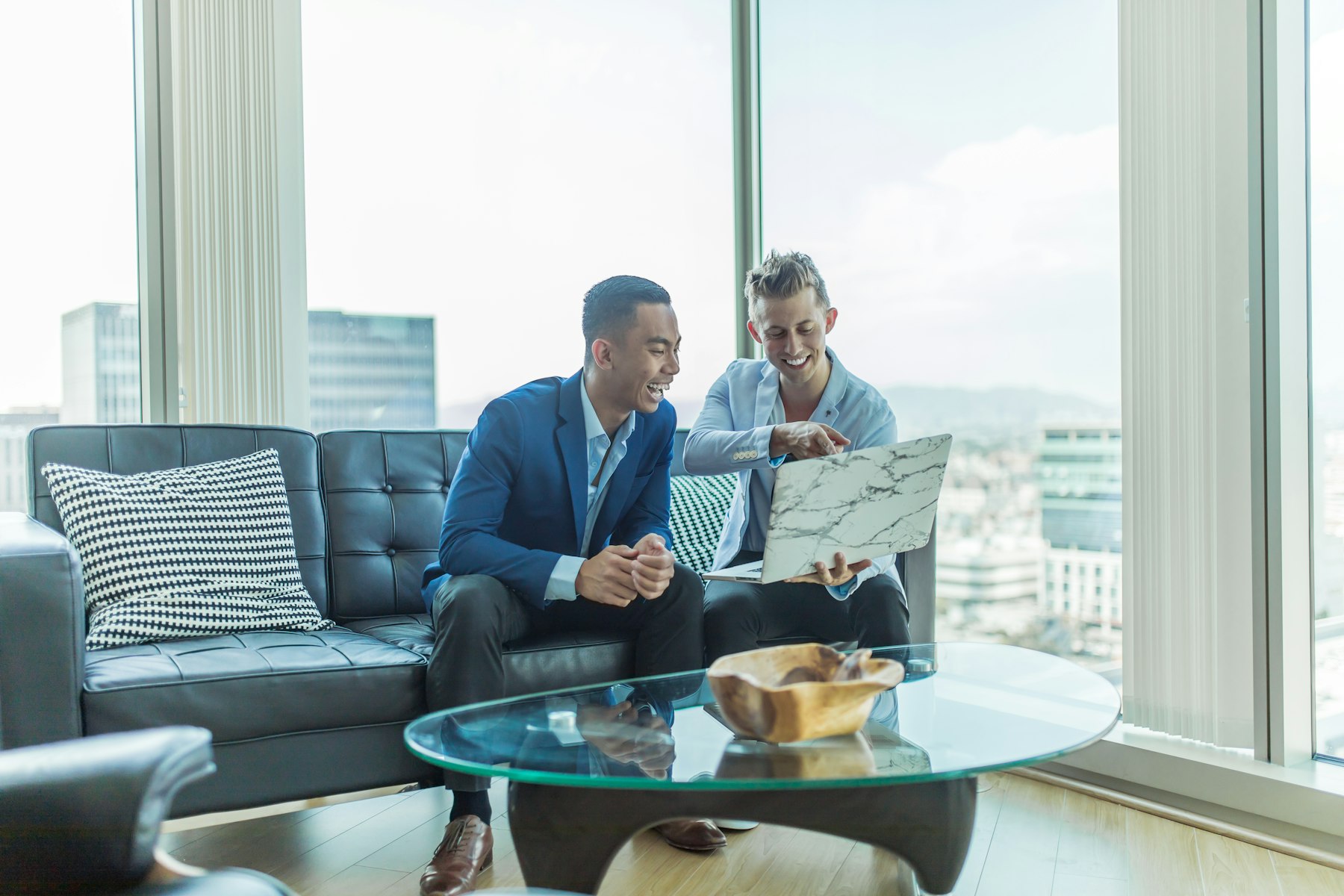Bookkeeping professionals reviewing financial reports together