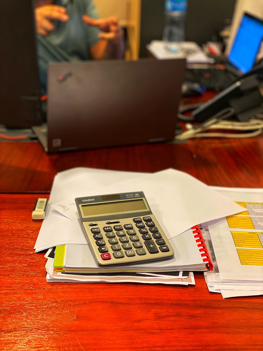 Office finance admin desk with calculator