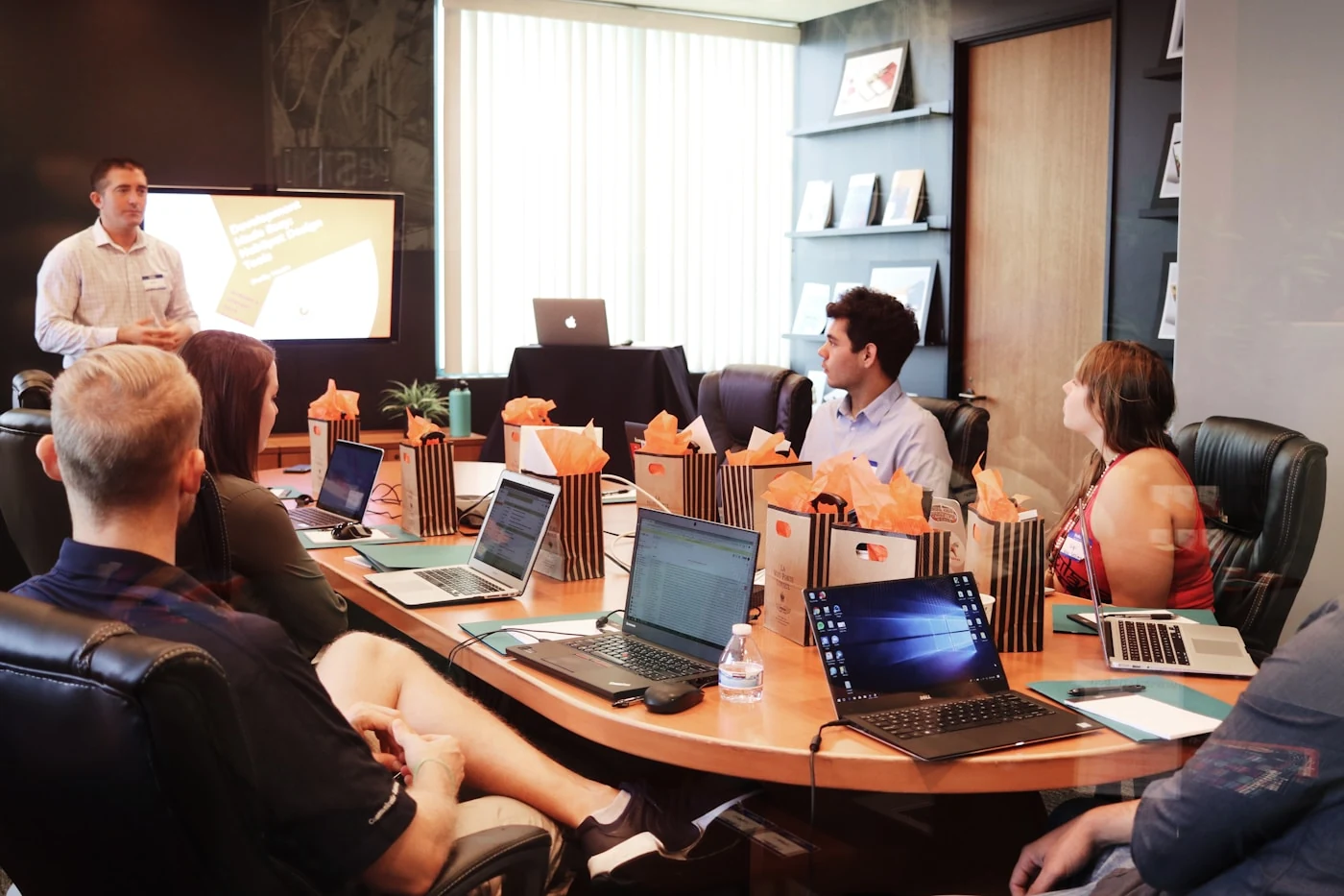 Marketing team reviewing branding strategy in a meeting