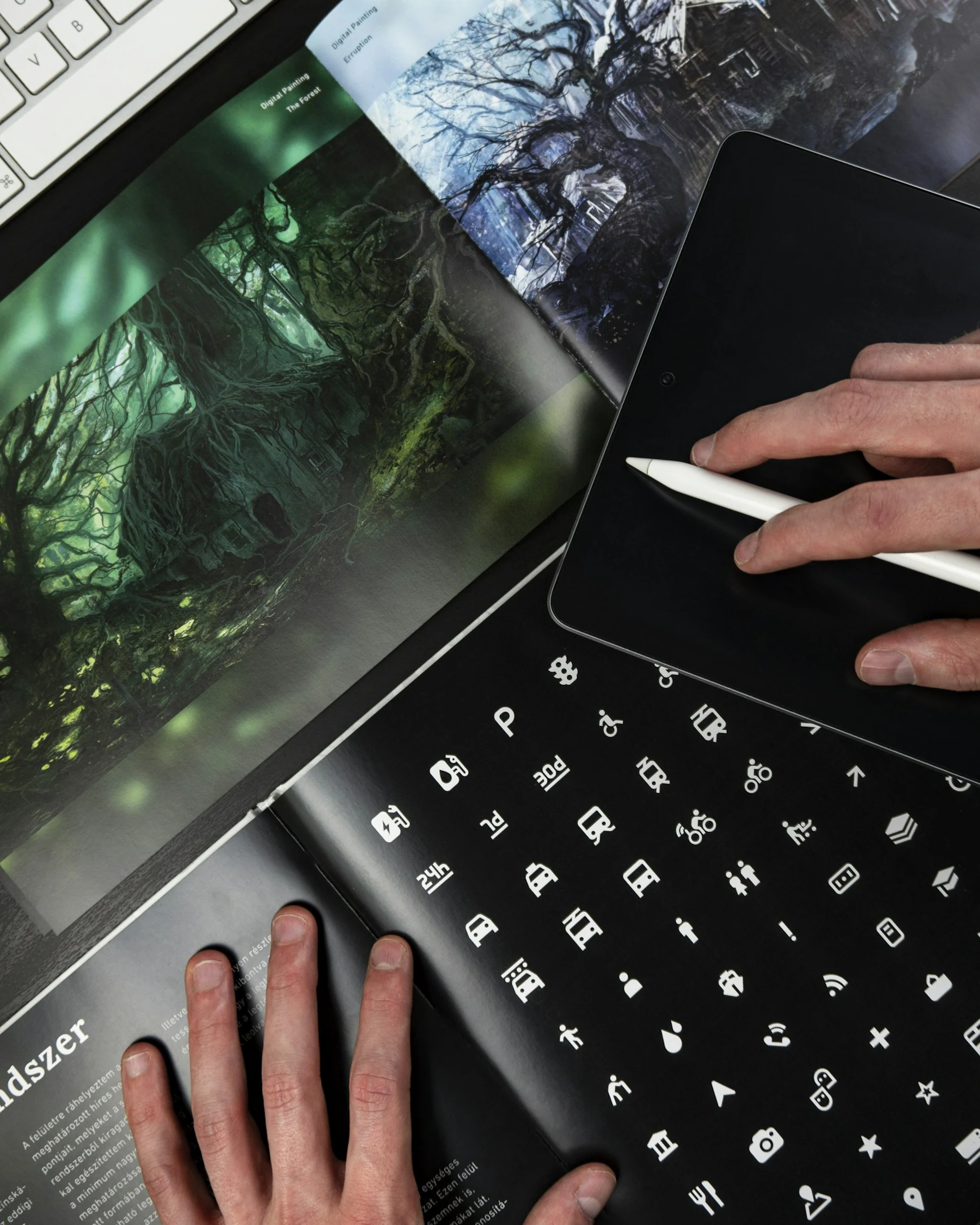Creative branding workspace with design books and tablet