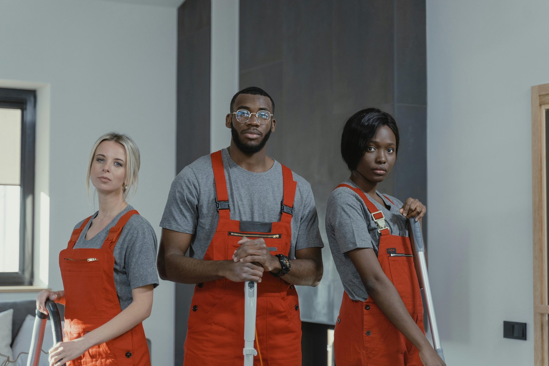Professional cleaning team with branded service identity
