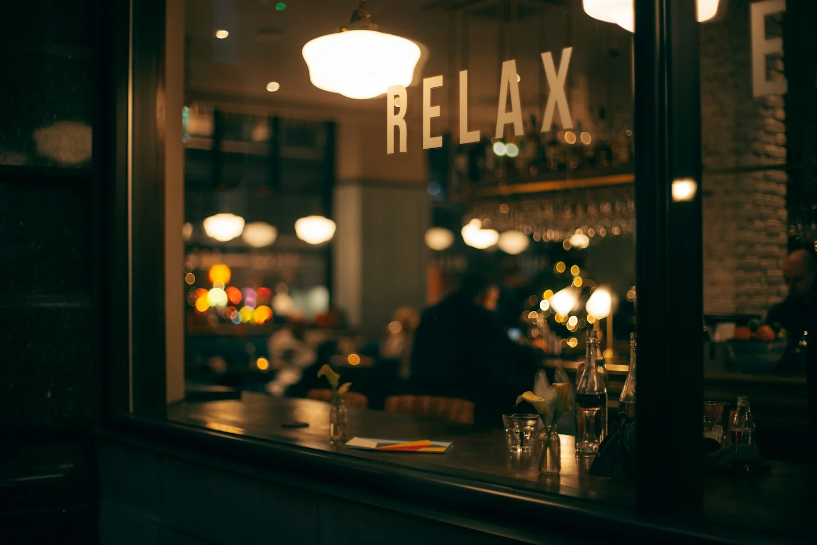 Warm coffee shop atmosphere with coffee cups