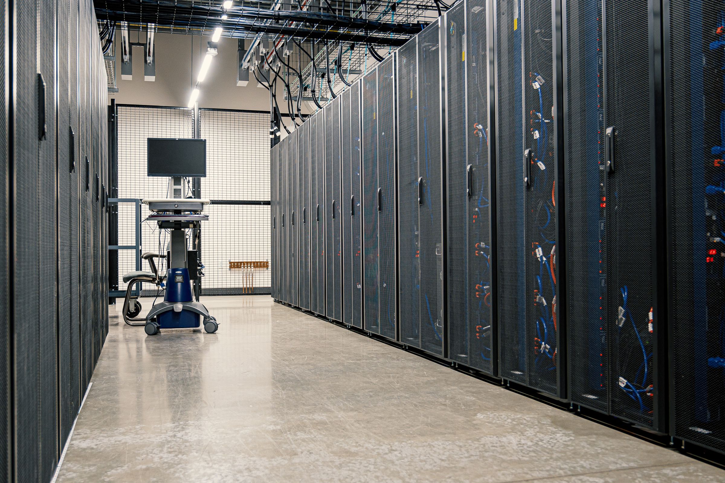 Modern data center server racks representing cybersecurity infrastructure