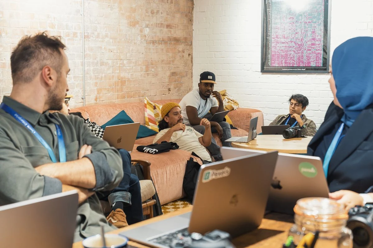Energy startup team collaborating in a modern office