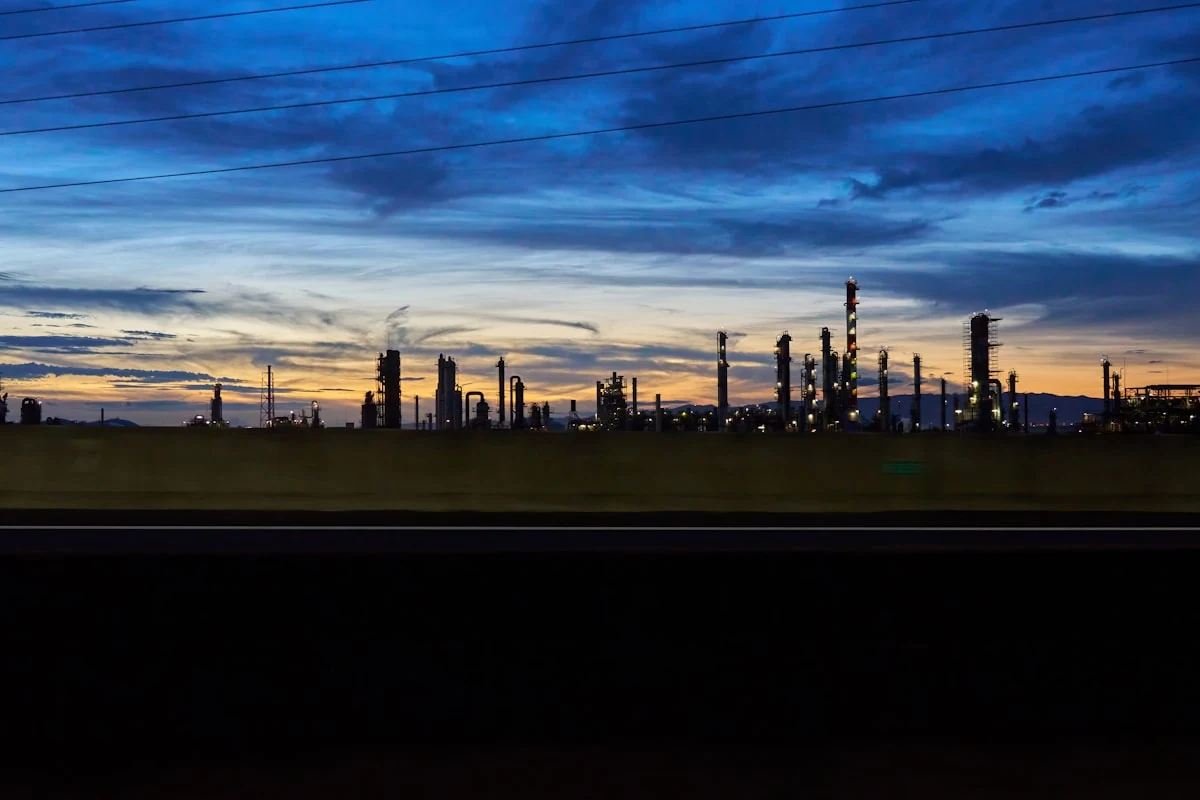 Oil and gas refinery at dusk