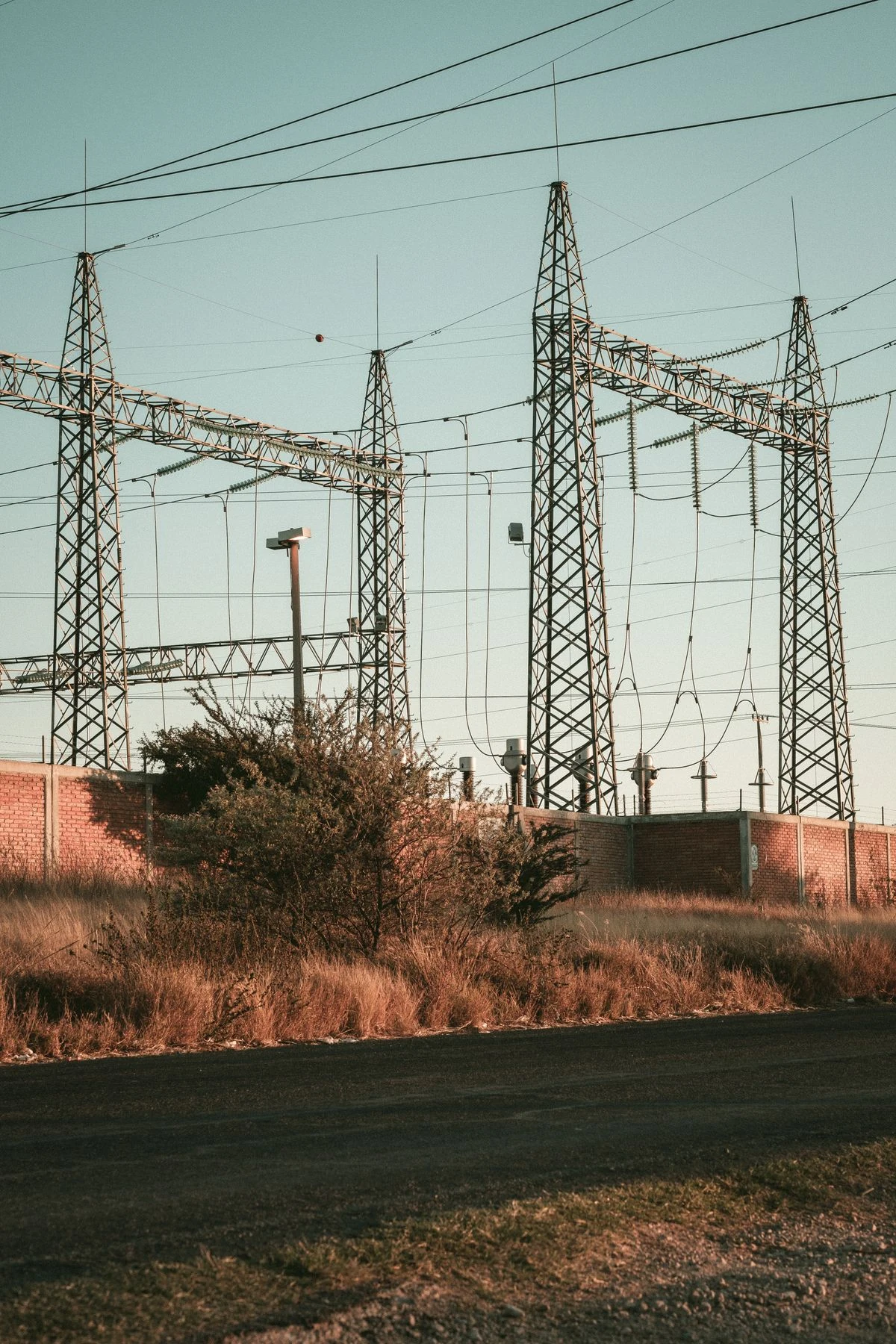 High voltage electrical substation in an open field