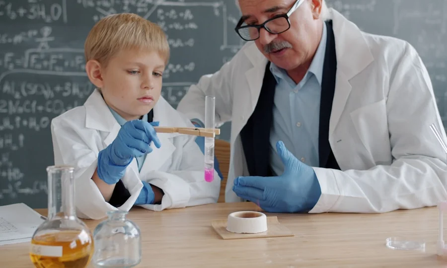 Teacher and student conducting a science experiment in classroom