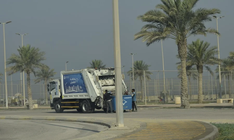 Garbage truck collecting waste for a waste management firm