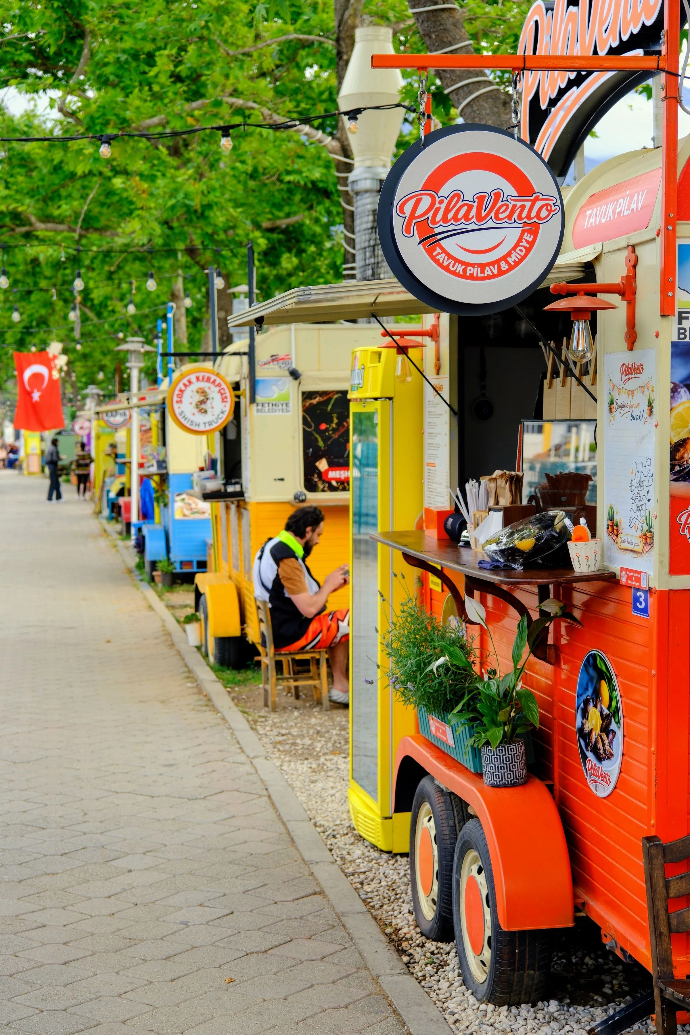 Food truck serving customers on a busy city street