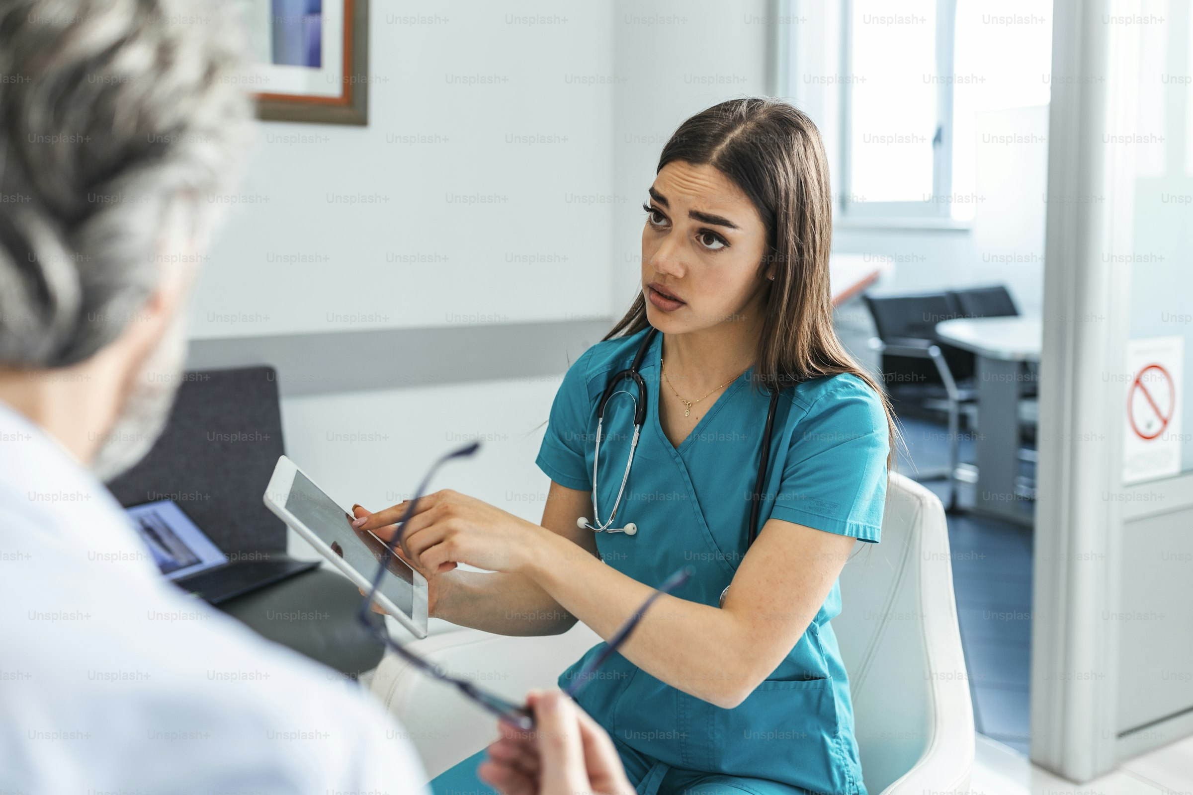 Healthcare team collaborating in modern medical office