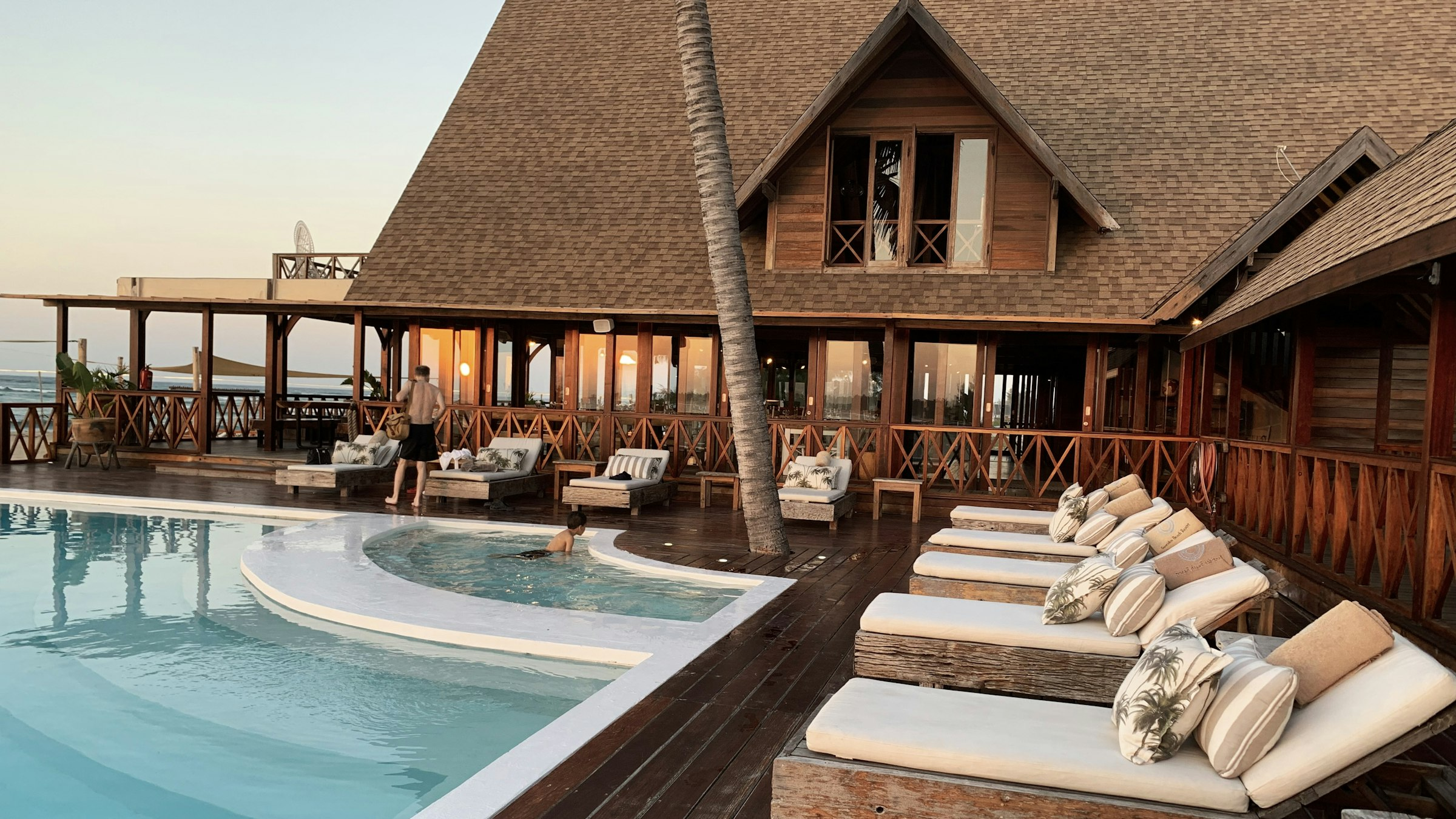 Luxury hotel exterior at sunset