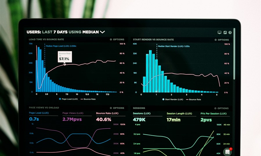 Asset manager analyzing investment portfolio on computer