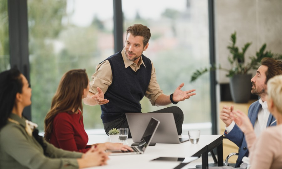 Corporate financial services team in modern business office