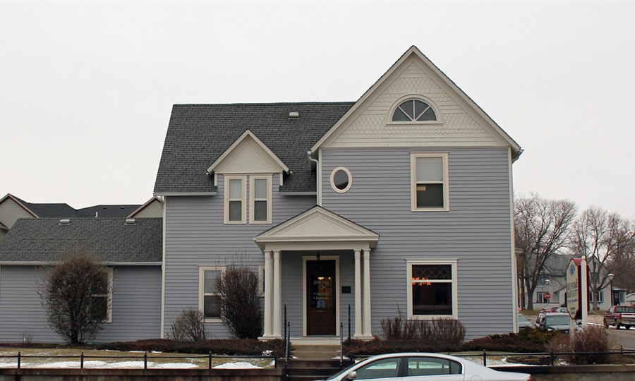 Real estate investment property with keys and contract signing