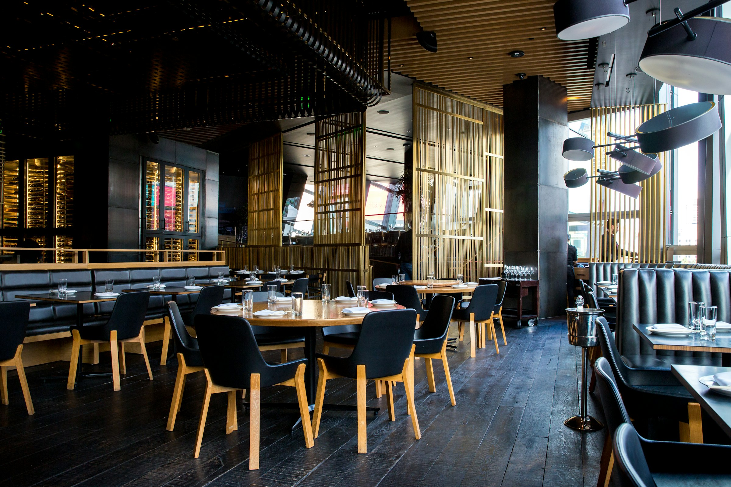 Warmly lit restaurant dining room ready for service