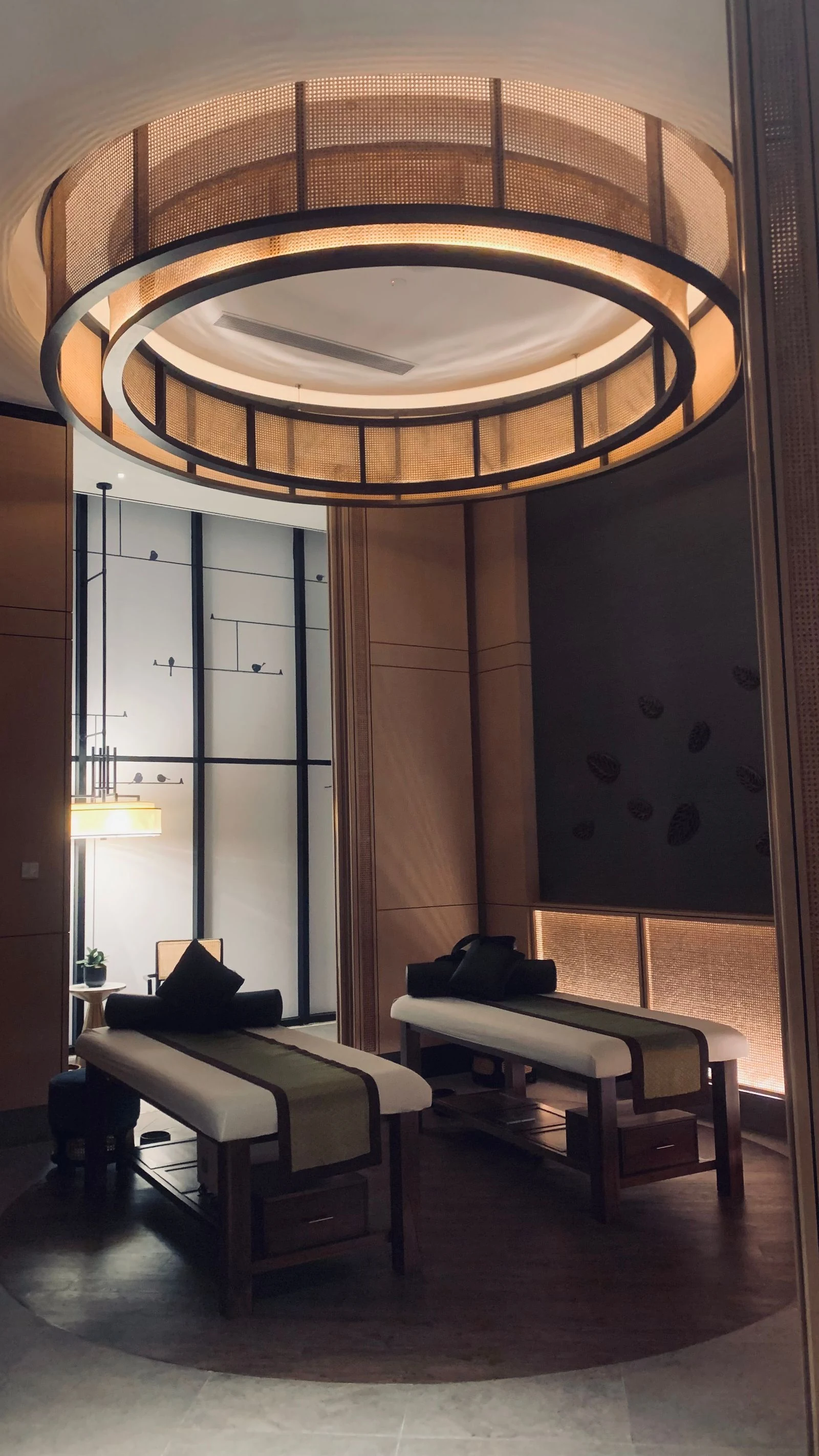 Calm luxury spa treatment room with soft natural light